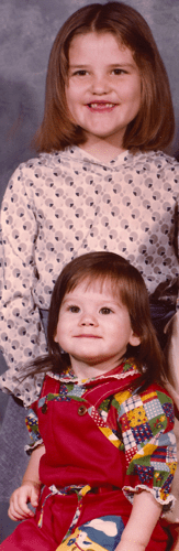 Two cousins. "My Cabbage Patch Kid" is the one sitting. 