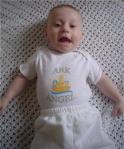 Baby in Ark Angle Onesie. Front full-length. Noah's Inspirations. All rights reserved.